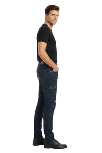 Man wearing dark blue jeans and a black t-shirt on a white background