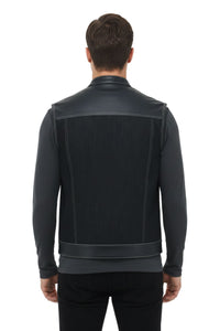 Man wearing a black leather jacket on a white background