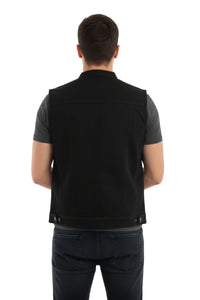 Man wearing a black vest on a white background