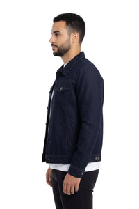 Man wearing a navy blue denim jacket on a white background