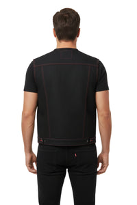Man wearing a black t-shirt with red stitching on a white background