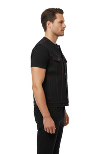 Man wearing a black vest on a white background