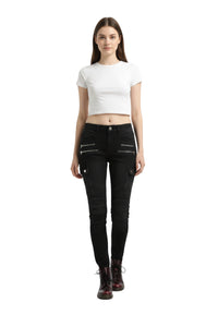 Woman wearing a white crop top and black jeans on a white background