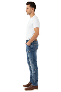 Man wearing blue jeans and a white t-shirt on a white background