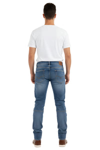 Person wearing blue jeans and a white t-shirt on a white background