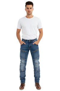 Man wearing a white t-shirt and blue jeans on a white background