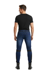 Man wearing blue jeans and black shoes on a white background