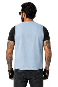 A man viewed from the back wearing a light blue denim vest over a black t-shirt and black jeans, on a solid white background.