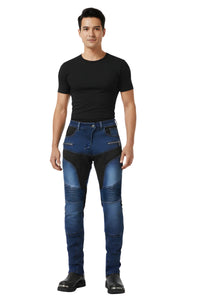 Man wearing blue riding pants with black accents on a white background