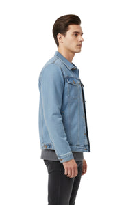 Man wearing a light blue denim jacket on a white background
