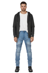 Man wearing a black hoodie, white t-shirt, and blue jeans on a white background