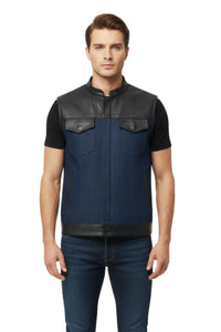 Man wearing a black and blue leather vest on a white background
