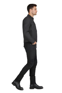 Man wearing a black jacket and pants on a white background