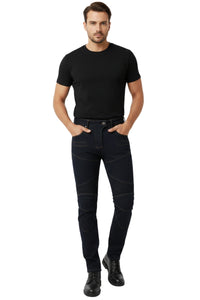 Man wearing a black t-shirt and black jeans on a white background