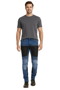 Man wearing a gray t-shirt and blue jeans with black accents on a white background
