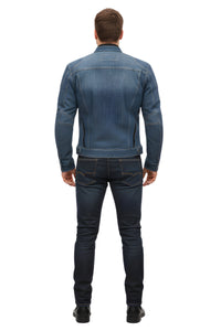 Motorcycle rider dressed in a durable Rider's Denim Jacket, offering a blend of comfort, style, and practicality.