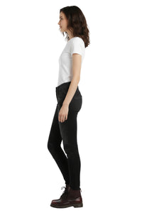 Person wearing black leggings and a white shirt on a white background