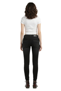 Person wearing a white t-shirt and black jeans on a white background