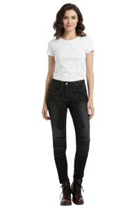 Woman wearing black jeans and a white t-shirt on a white background