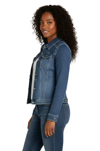Woman wearing a blue denim jacket on a white background