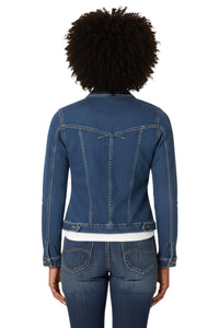 Person wearing a blue denim jacket on a white background
