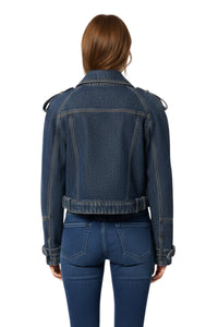 Person wearing a blue denim jacket and jeans on a white background